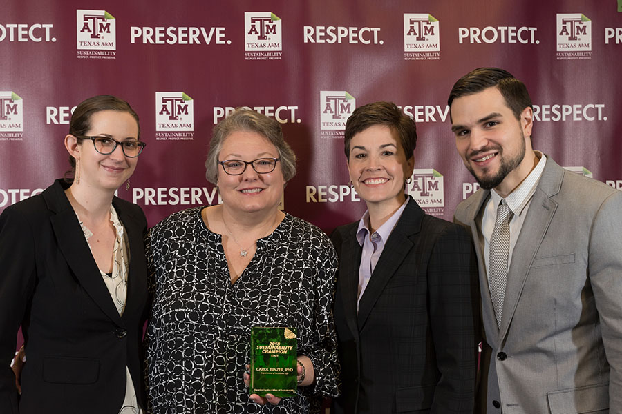 Carol Binzer accepts the Sustainability Champion Award.