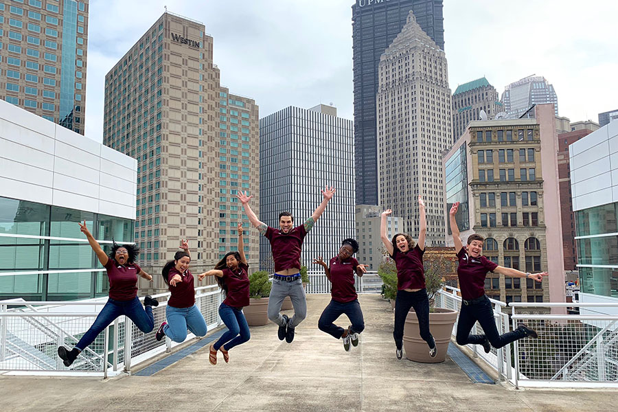 The Sustainability staff and interns celebrate attending the Association for the Advancement of Sustainability in Higher Education in Pittsburg in 2018. 