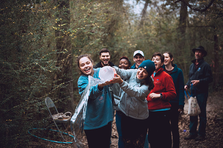 Staff and student interns participate in a team building exercise.