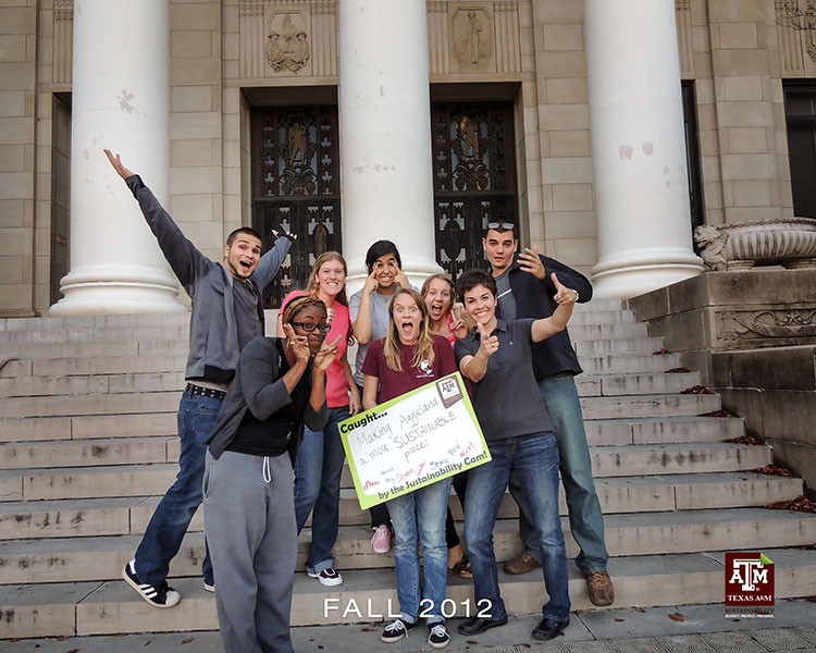 The Fall 2012 Interns celebrate together on the steps of the JK Williams Administration Building.