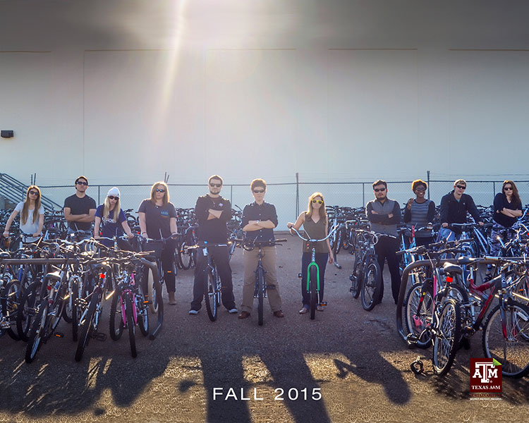 The student interns gathered at the bike barn.