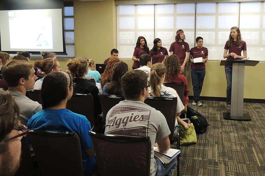 Student interns making a presentation in the Spring of 2013.