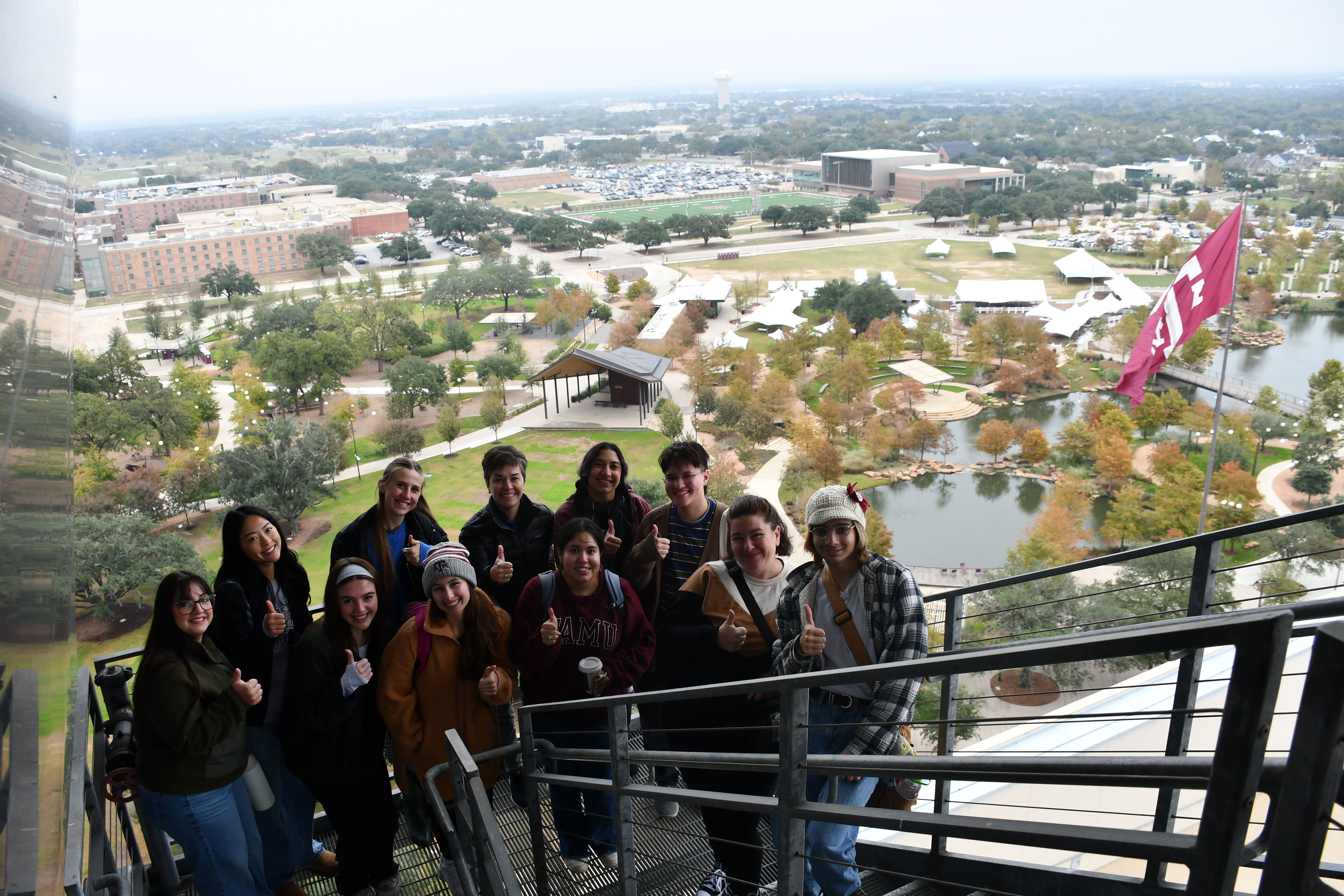 The student interns and staff attended a Kyle Field Tour and took a picture overlooking Aggie Park in the Fall of 2025.
